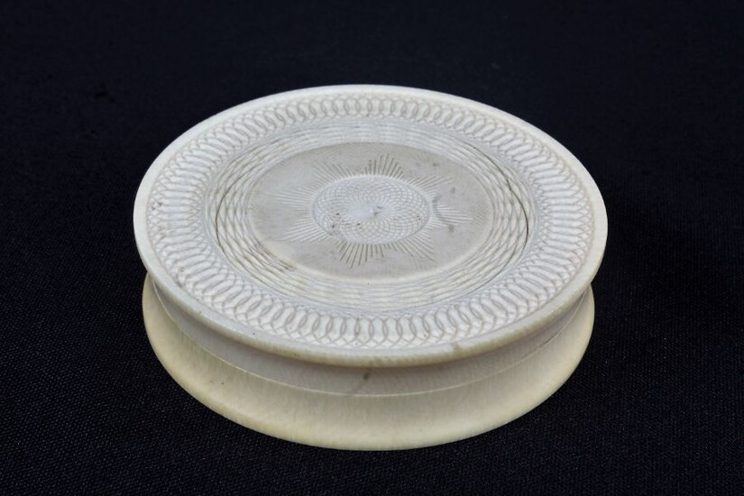 Early 19th Century ivory pot and cover, of cylindrical form with engine turned decoration, 8.5cm