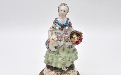 FLOWER WOMAN, PORCELAIN FIGURE ON BRONZE BASE, GOLD PAINTING, FRANCE, MID-19TH CENTURY.