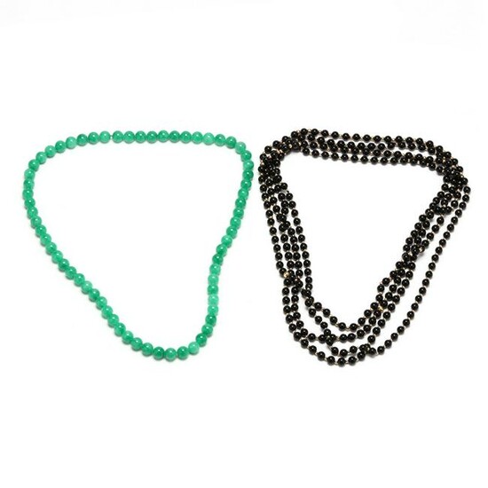 Four Black Jade Bead Necklaces and a Green Jade Bead
