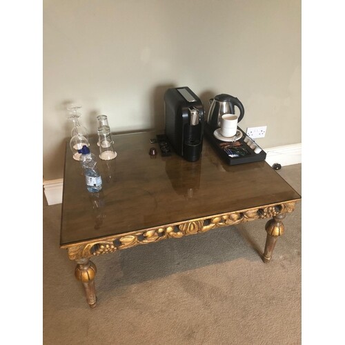 French style carved wood and gilt coffee table with glass to...