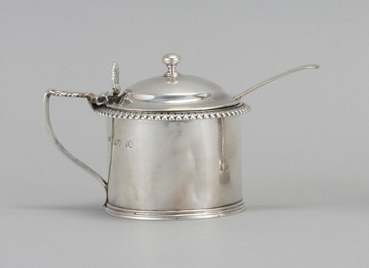 GEORGE IV STERLING SILVER MUSTARD POT AND GEORGE III SPOON 1) Mustard pot with cast leaftip rim, shell-form thumbpiece and period ru...