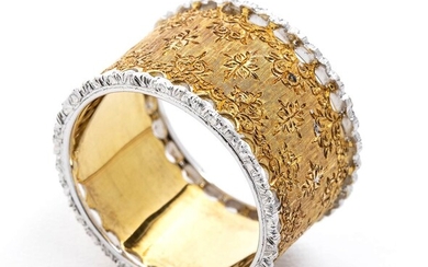 Gold and diamonds ring - by MARIO BUCCELLATI18k two-color gold, large band worked with an...