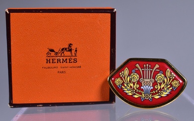 HERMES PARIS. Broche en métal doré à décor émaillé en polychromie d'une lyre sur fond...