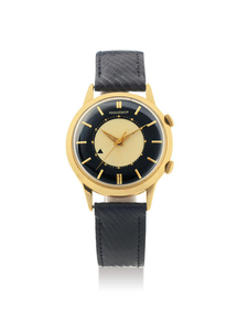 Jaeger-LeCoultre. A Rare Yellow Gold Centre Seconds Wristwatch with Alarm, Date and Champagne and Black Dial