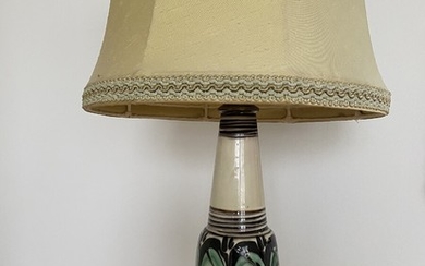 Kähler: An earthenware table lamp. Decorated with green, black and cream coloured glaze. Signed HAK. Made by Kähler. H. 28 cm.