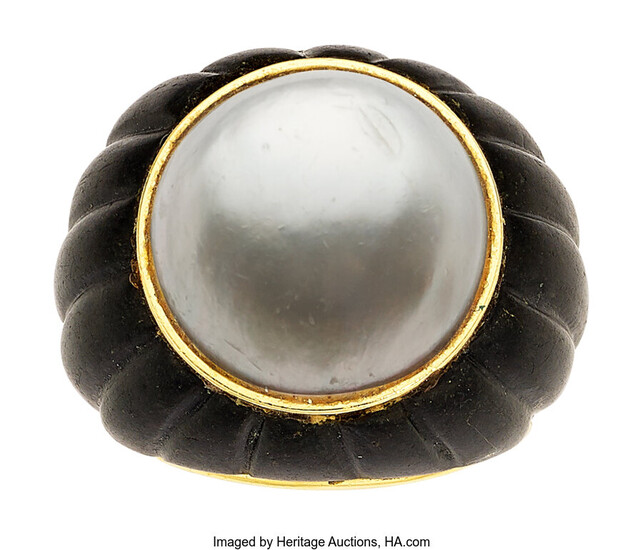 Mabe Pearl, Black Onyx, Gold Ring Stones: Carved black...