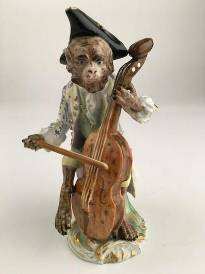 Meissen monkey band member playing a cello.