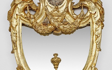 Miroir mural baroque Bois, sculpté, serti et doré. Encadrement de miroir profilé, semblable à un...