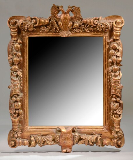 Miroir rectangulaire en bois richement sculpté... - Lot 131 - Le Floc'h