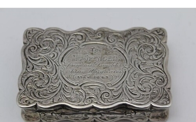 NEILL & COOK A silver snuff box, serpentine form with hinged...