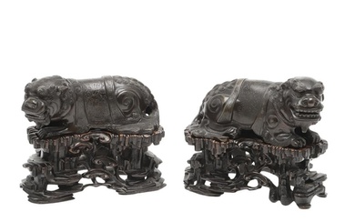 PAIR OF CHINESE BRONZE DOGS OF FO & CARVED WOODEN STANDS. Pr...