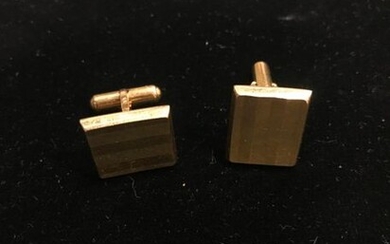 Pair of 750/1000e gold rectangular cufflinks with amati...