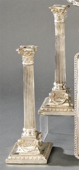 Pair of English silver candlesticks punched Sterling