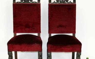 Pair of Italian Renaissance chairs with cherub crests
