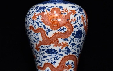 Qing Dynasty Qianlong blue and white alum red plum vase with gold and dragon patterns