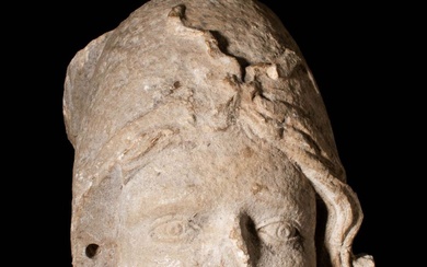 ROMAN MARBLE HEAD OF A YOUTH WITH PHRYGIAN HAT