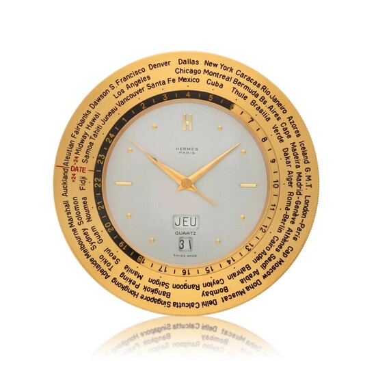 Reference 848, A gold plated world time desk timepiece with day and date, Circa 1955, Hermès
