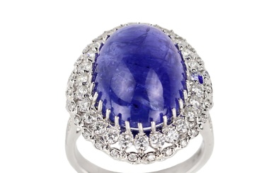 Ring in 18K white gold with tanzanite, cabochon cut, and...