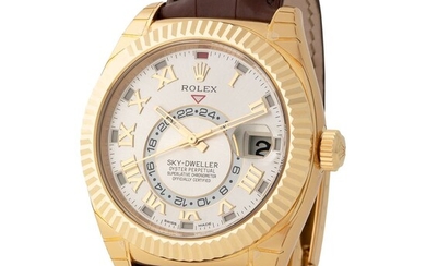 Rolex. Large and Massive Sky-Dweller Automatic Wristwatch in Yellow Gold, Reference 326 138, With Silver Dial