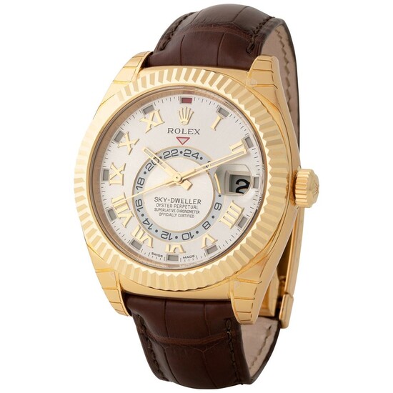 Rolex. Large and Massive Sky-Dweller Automatic Wristwatch in Yellow Gold, Reference 326 138, With Silver Dial
