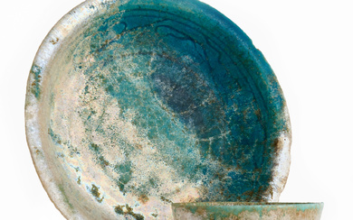 SAUCER AND BOWL, Persia, Safavid (1501—1736) or earlier, probably Keshan, earthenware with glaze in turquoise and iridescent patina.