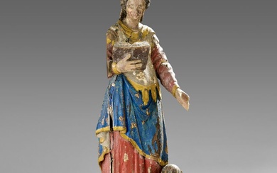 "Sainte Catherine" Sujet en bois sculpté polychromé. A ses pieds l'empereur la condamnant au martyr....