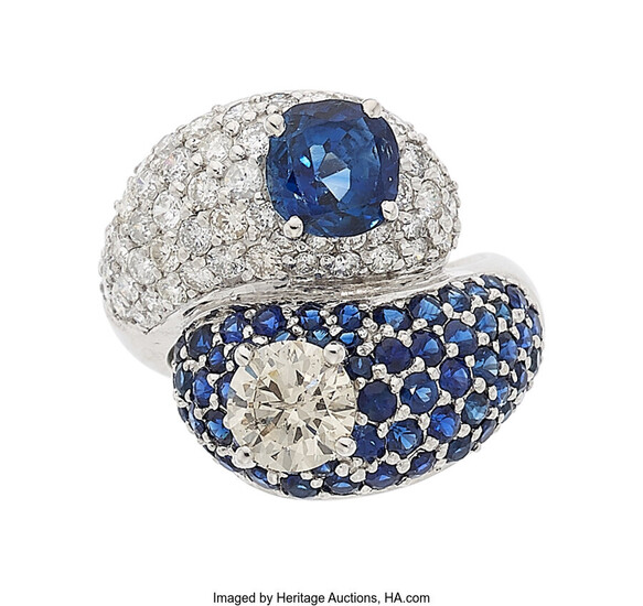 Sapphire, Diamond, White Gold Ring The ring features a...