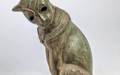 Stylized Bronze Cat Sculpture. Seated cat with hollow