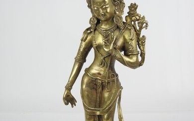 TIBET. Très élégante figure de Manjusri en bronze représentée debout sur un socle. XXème siècle....