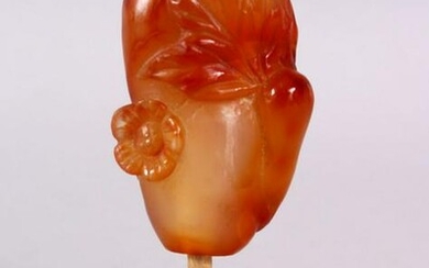 TWO CHINESE CARVED AGATE SNUFF BOTTLES, One carved with