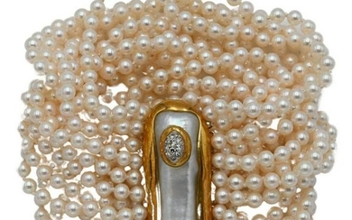 Tambetti 17 Strand Pearl Bracelet, having 18 karat gold
