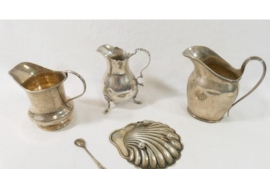 Three small silver cream jugs, comprised of a Georgian style...