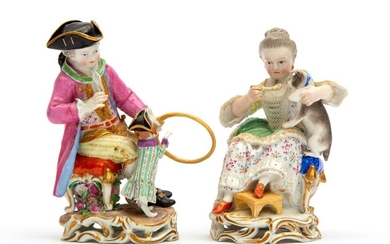 Two Meissen porcelain figures of a boy and a girl