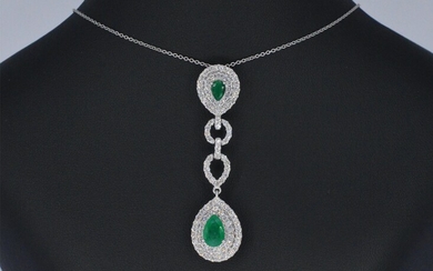 White gold pendant set with diamonds and emeralds