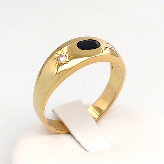 18 kt yellow gold ring with zircons