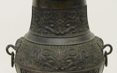 19th Century Chinese bronze two-handle vase. Archaic