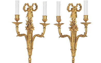 A pair of French late 19th century gilt bronze twin branch wall lights