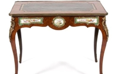 A Louis XV Style Gilt Bronze and Sevres Style Porcelain Mounted Writing Table