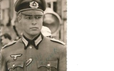 Marlon Brando signed 6 x 4 b/w photo in German Uniform. Good Condition. All signed pieces come with a Certificate of Authenticity....