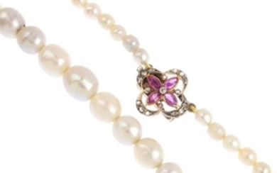 A natural pearl single-strand necklace. Comprising a