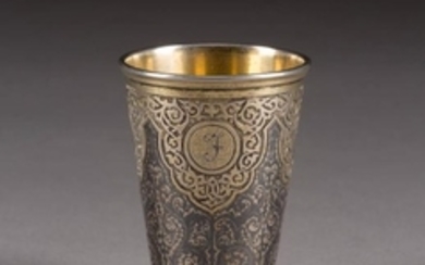 A SILVER-GILT AND NIELLO BEAKER Russian, Moscow, 1871