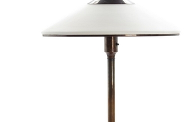 Danish design: “Kongelys”. A browned brass table lamp with opal glass shade. No. 41/500. Manufactured by Horn Belysning. H. 54 cm.