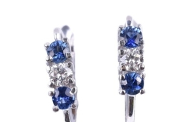 A pair of sapphire and diamond three stone earrings