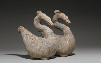 A RARE PAIR OF PAINTED POTTERY GOOSE-FORM VESSELS AND COVERS, HAN DYNASTY (206 BC-AD 220)