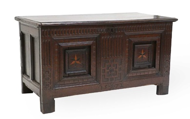A 17th Century Joined Oak Chest, the hinged lid enclosing...