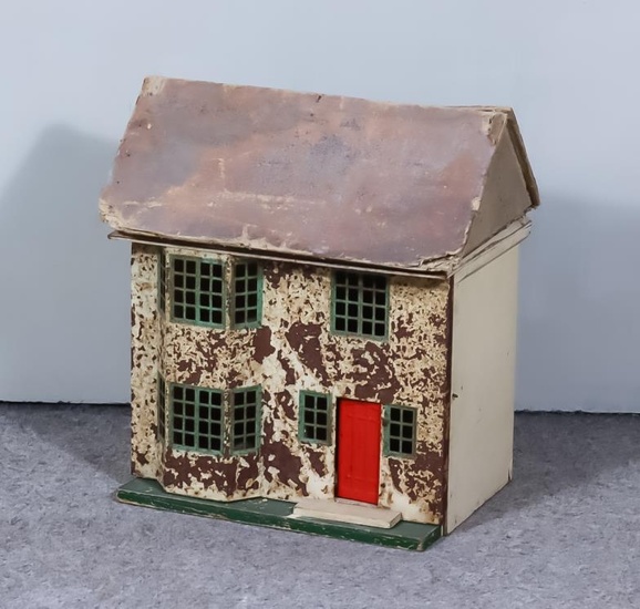 A 1930's Triang Painted Metal Doll's House, 18.5ins wide...