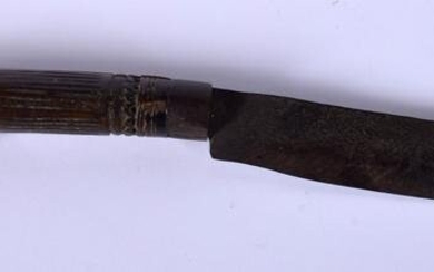A 19TH CENTURY AFRICAN HARDWOOD TRIBAL KNIFE with