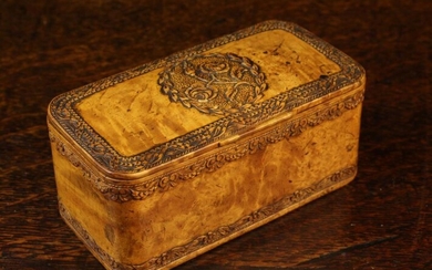 A 19th Century French Carved Burr Maple Snuff Box. The oblong box with rounded corners; the hinged l