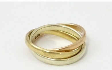 A 9ct tri-gold Russian wedding ring. Ring size approx. G 1/2