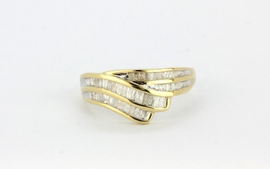 A 9ct yellow gold ring set with baguette cut diamonds, (O).